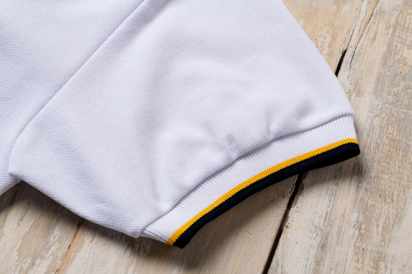 POLERA UNISEX PIQUÉ BLANCA MANGA CORTA TEI